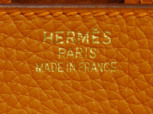 Hermès bag detail reference photo. Source: https://commons.wikimedia.org/wiki/File:Hermes-made-in-france.jpg; check source license. Not a confirmed Cargo Birkin image.